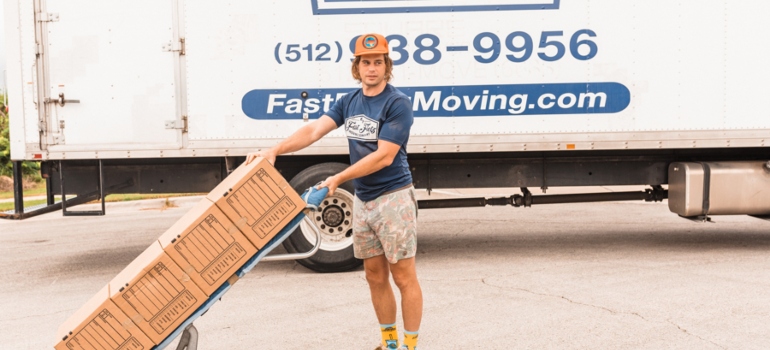 a mover in front of a moving truck